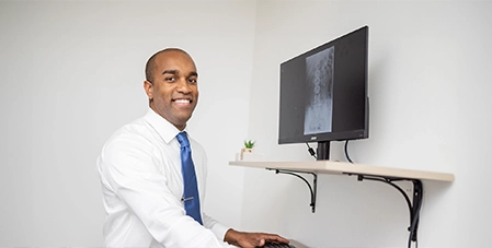 Chiropractor Manchester NH George Jumpp Studying XRay
